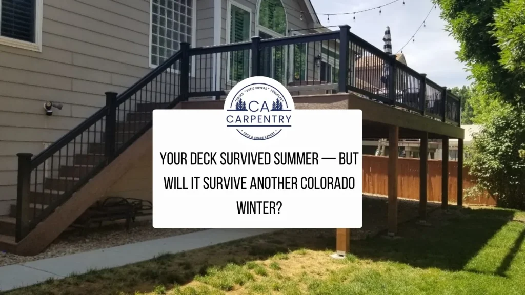 Wood deck dusted with early snow behind a Colorado home, checked for deck winter damage before the season